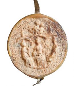 Siegel des Stifts Ramelsloh aus dem Jahr 1282 - das Siegel zeigt unter einem Baldachin den Stiftsgrün-der Ansgar und die beiden Stiftspatrone Sixtus und Sinnitius, in der Mitte über Ansgar Maria mit dem Jesuskind.